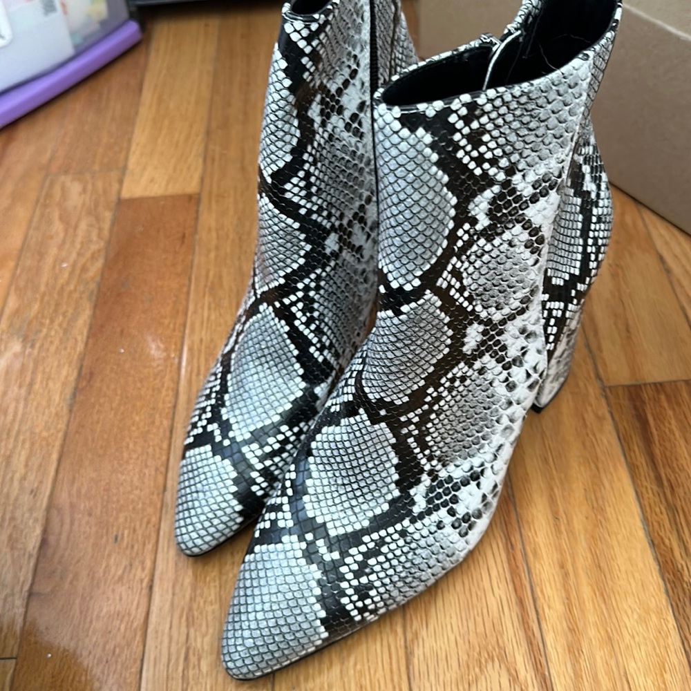 Snakeskin pointed toe heeled booties